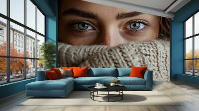 A close-up view of a person wearing a sweater, ideal for use in fashion or portrait photography Wall mural