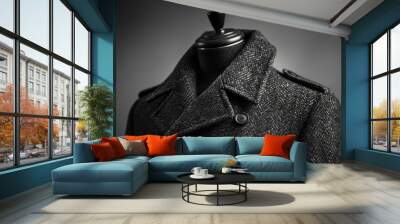 A coat hangs on a mannequin, showcasing its design and texture Wall mural