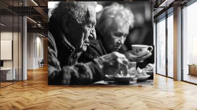 A couple of people sitting at a table enjoying a meal together. Perfect for illustrating shared meals, dining experiences, and relationships Wall mural