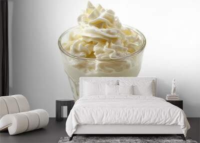 A glass filled with whipped cream on top of a table, perfect for dessert or coffee Wall mural