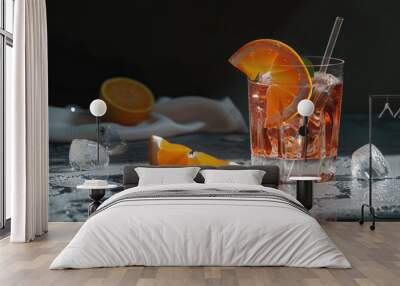 A glass of orange juice with a slice of orange. Perfect for health and nutrition concepts Wall mural