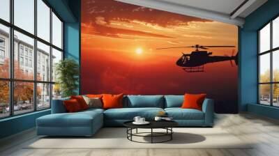 A helicopter flying in the sky at sunset, suitable for transportation concepts Wall mural