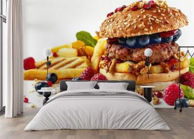 A juicy burger topped with fresh fruit and served with crispy french fries Wall mural