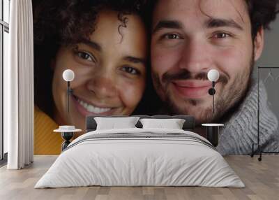 A man and a woman smiling at the camera. Suitable for advertising campaigns. Wall mural