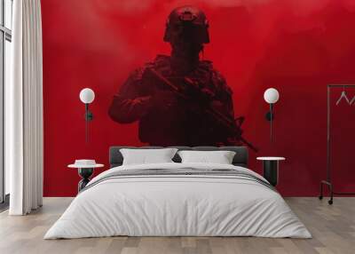 A man in a military uniform holding a gun. Suitable for military or security concepts Wall mural