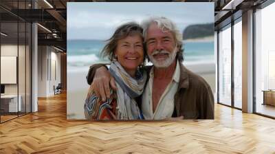 A pair of people enjoying the ocean view on a sunny day Wall mural