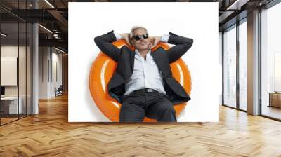 A person enjoying leisure time on a floating raft, wearing casual attire Wall mural