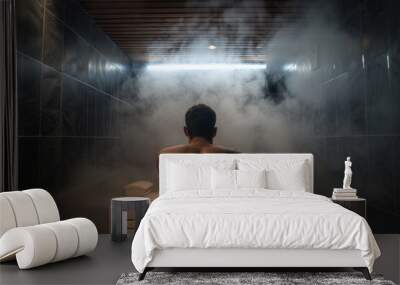 A person in a steam room, surrounded by mist and heat Wall mural