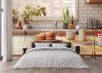 A plate of doughnuts sitting on a table in a kitchen. Perfect for food and cooking themes Wall mural