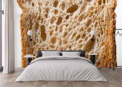 A slice of bread with holes, perfect for food concepts Wall mural