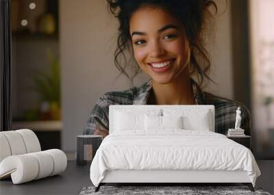 A smiling woman holds a bowl of fresh salad Wall mural