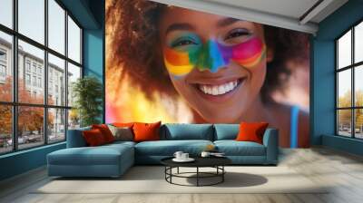 A smiling woman with a colorful rainbow painted on her face, perfect for illustrating positivity and creativity Wall mural