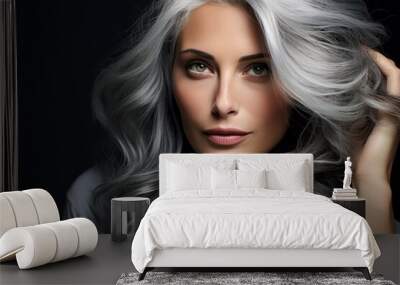 A woman with grey hair posing for a picture. This image can be used for various purposes, such as portraying elegance, aging gracefully, or showcasing natural beauty. Wall mural