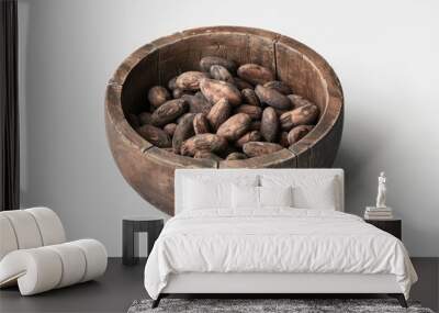 A wooden bowl filled with nuts on a white surface. Ideal for food and nutrition concepts Wall mural