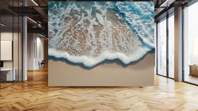 Close up of a wave on a beach, perfect for summer-themed designs. Wall mural