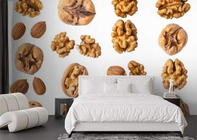 Close-up of walnuts and walnut kernels on a white surface Wall mural