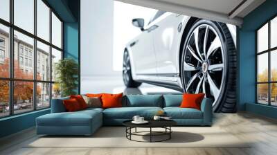 Detailed view of car wheels on reflective ground. Ideal for automotive industry promotions Wall mural