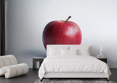 Freshly cut apple sits atop a clean white surface, ready for display or photography Wall mural