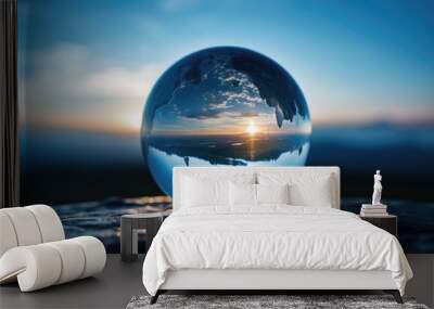 Glass ball in nature by the lake. Wall mural