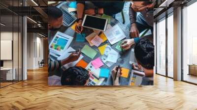 Group of people collaborating on laptops, possibly in coworking space or coffee shop Wall mural