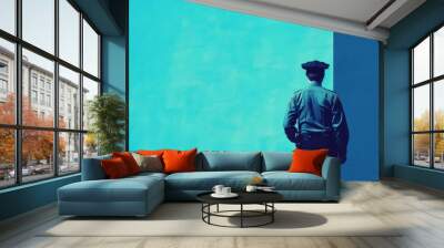 Law enforcement officer standing against a blue background. Suitable for crime prevention concepts Wall mural