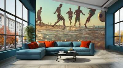 People having fun playing soccer on the beach Wall mural