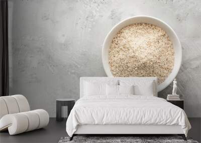 Simple white bowl filled with rice, perfect for food and cooking concepts Wall mural