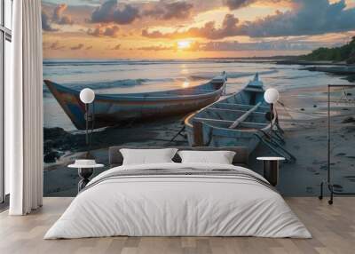 Two boats resting on a sandy beach, perfect for travel brochures Wall mural