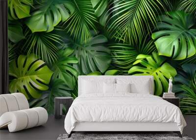 Vibrant green tropical leaves on a contrasting black background. Perfect for nature or botanical themed designs Wall mural