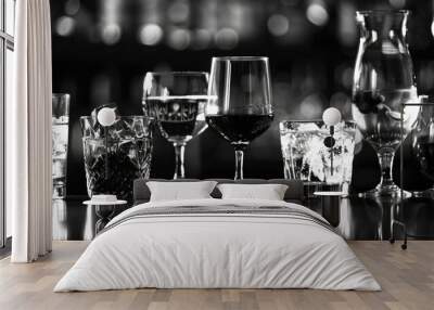 wine glasses arranged on a table, suitable for dining or celebration concepts Wall mural