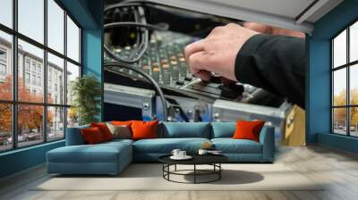 Studio sound mixing board met handen aan de knoppen and selective focus Wall mural