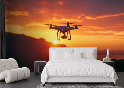 Quadcopter drone flying at sunset with camera over scenic mountains, capturing aerial photography, technology and adventure concept Wall mural