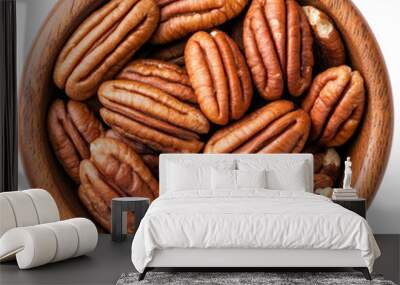 Top view pecans neatly arranged in wooden bowl isolated on transparent background  Wall mural