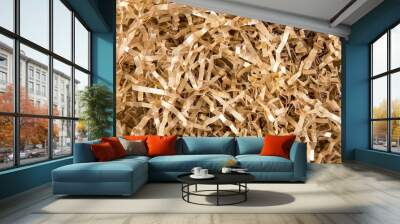 Gold color shredded paper - gift box filler background. Wall mural