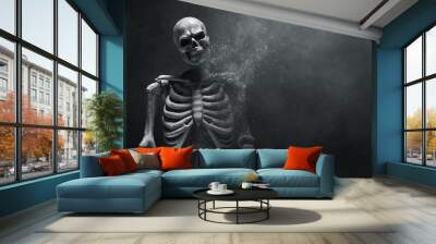 Human skeleton death on dark background Wall mural