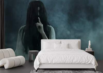 Scary ghost woman on dark background Wall mural