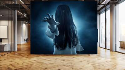 Scary ghost woman on dark background Wall mural