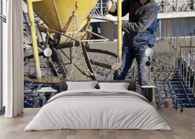 builder worker pouring concrete at construction site Wall mural