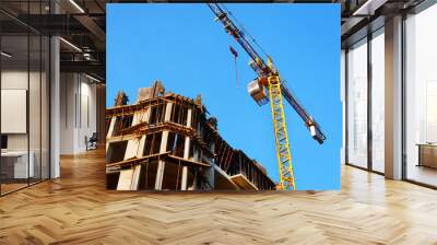 Construction site background. Crane near building. Industrial background. Wall mural