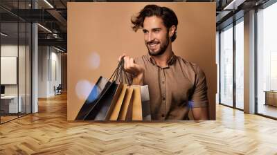  Man shopping during sales period, perfect for retail promotions. _1(410) Wall mural