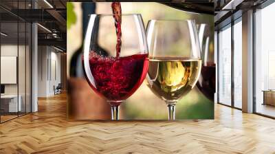  Red and white wine being poured into glasses, symbolizing celebration. _1(790) Wall mural