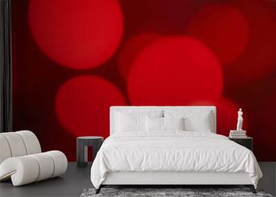 Vibrant red lights create a festive atmosphere with a vintage and abstract feel during the holiday season. Wall mural