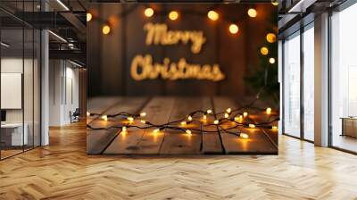 Wood table displays Christmas lights with a merry Xmas background in rustic vintage style. Wall mural