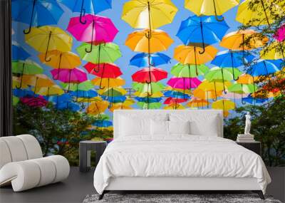 Colorful hanging umbrellas in a outdoor plaza in Miami Wall mural