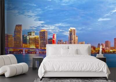 miami florida at sunset, cityscape of modern downtown buildings illuminated with reflections in the  Wall mural