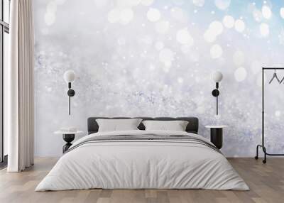 Chritmas light background with snow and blue sky. Wall mural