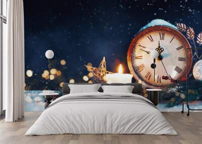 New Year's clock. Decorated with balls, star and tree on snow Wall mural