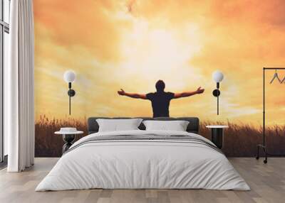 Silhouette of man and sunshine Wall mural