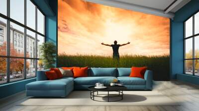 Silhouette of man and sunshine Wall mural