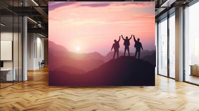 three guys celebrating victory on top of a mountain Wall mural